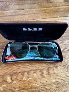 Garrett Leight Aviator Sunglasses with Green Lenses and Gold Frame